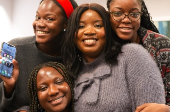 Friends from Petra Glasgow smiling together
